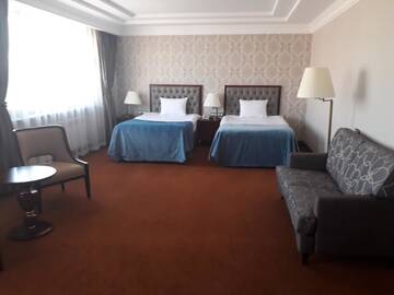 Фото номера Двухместный номер с 2 отдельными кроватями Отель Sultan Plaza hotel г. Qyzylorda 3